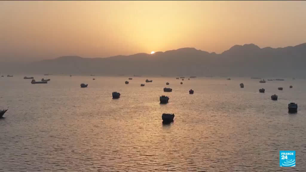 A cargo ship in the Strait of Hormuz targeted by Iran