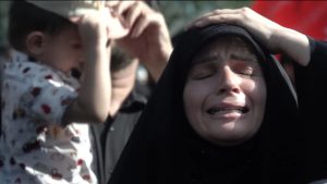 In Tehran, funeral attendees grieve the loss of supreme leader Ali Khamenei