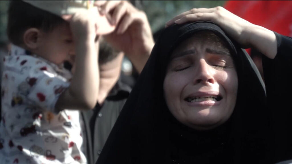 In Tehran, funeral attendees grieve the loss of supreme leader Ali Khamenei