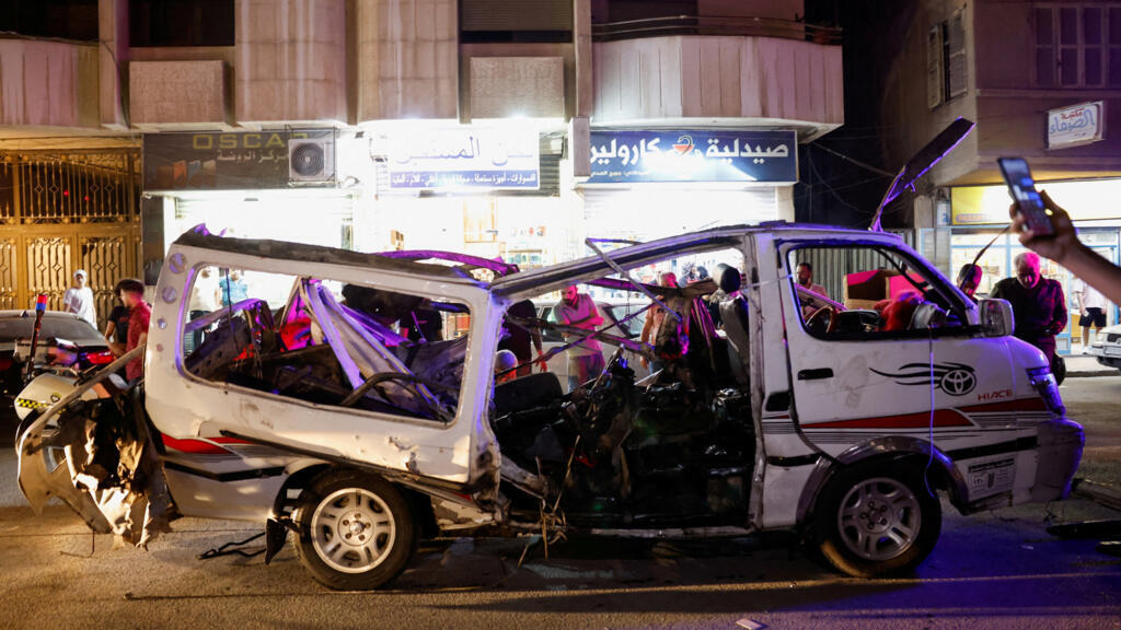 Bus explosion near Damascus kills at least two, injures 13
